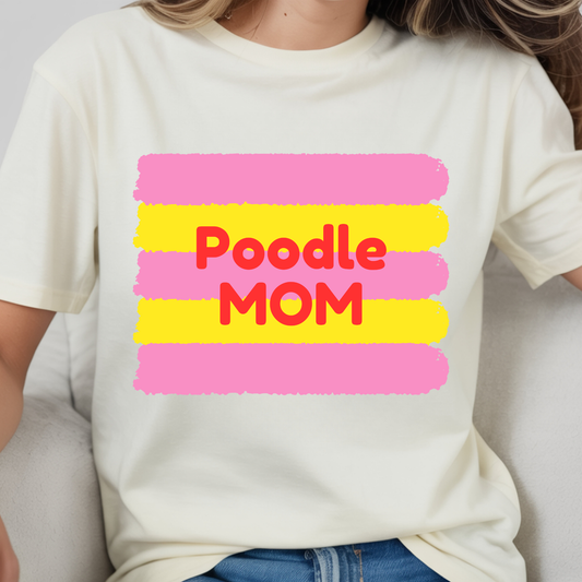 White t-shirt with 'Poodle Mom' text in red and pink stripes on a plain background
