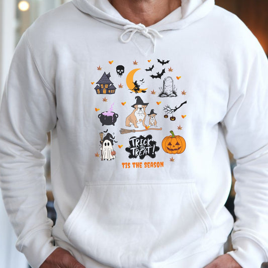 White hoodie with Halloween themed dog and spooky icons, “Trick or Treat ‘Tis the Season” text, festive autumn design