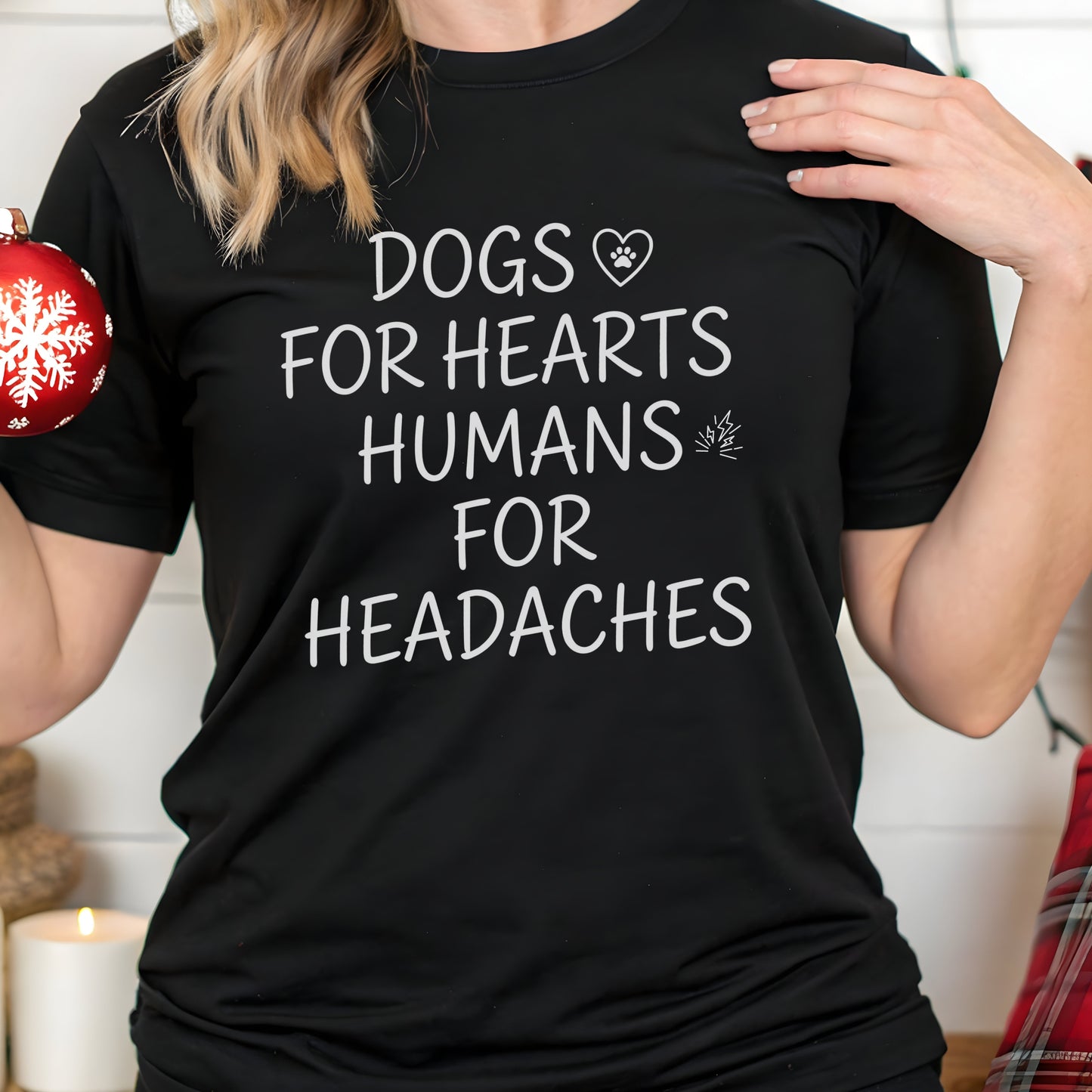 Person wearing a black t-shirt with a humorous dog-themed message.