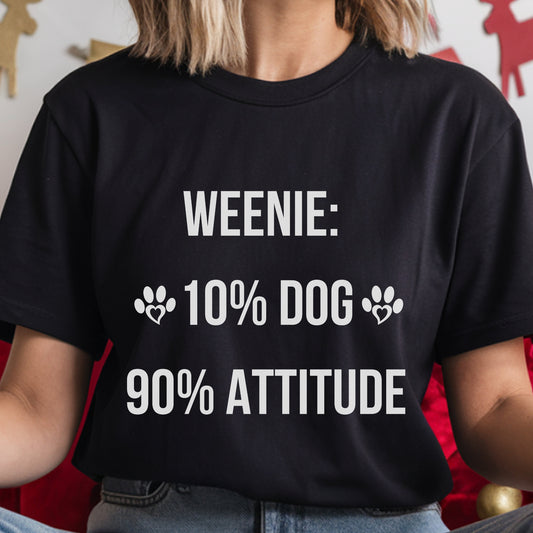 Person wearing a black t-shirt with humorous text design.