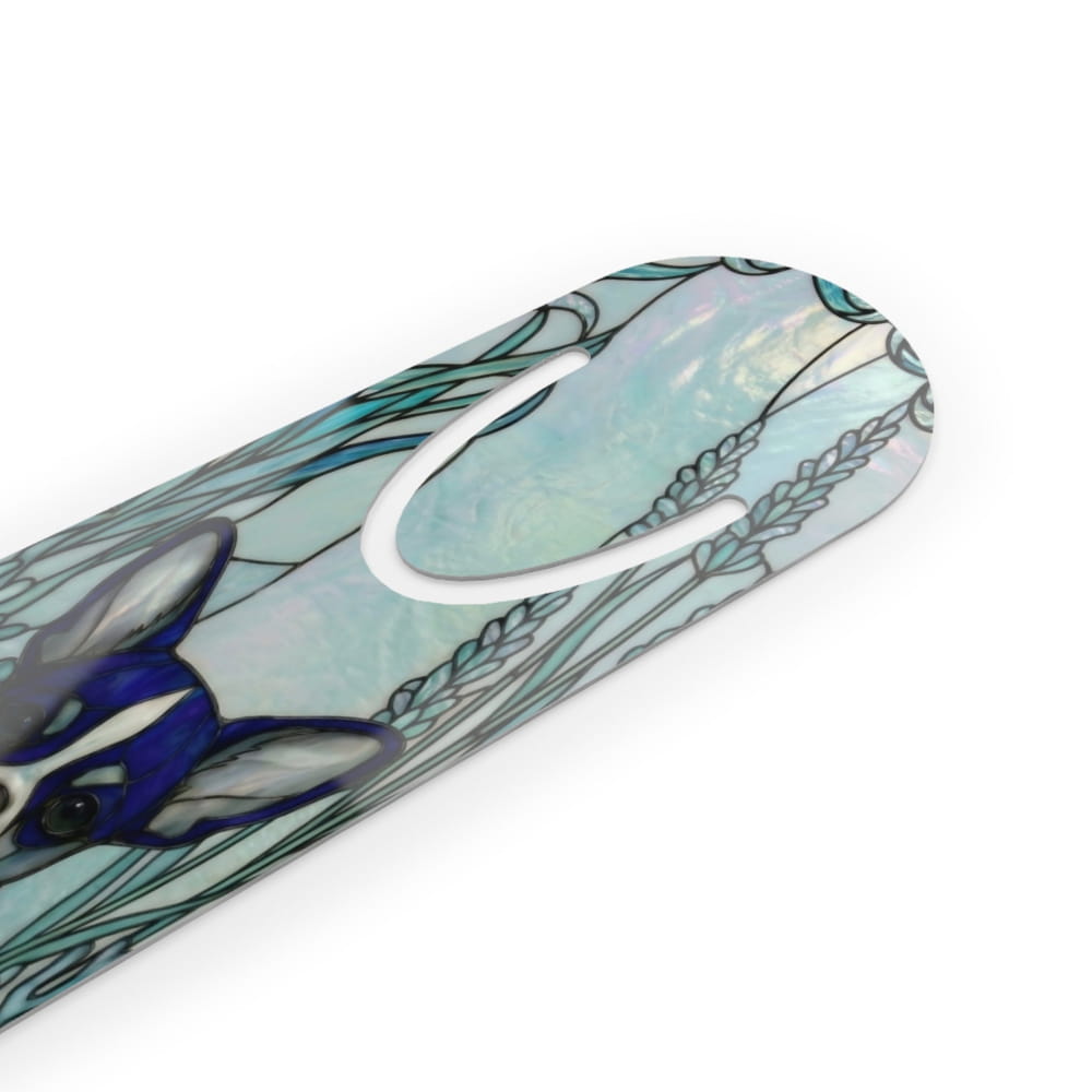 A close-up of a curved product featuring a stained-glass style illustration of a blue and white dog with teal and gray floral details on a white background.