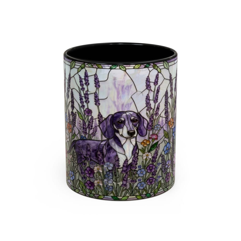 A cylindrical ceramic mug featuring a stained-glass style illustration of a purple and white dachshund surrounded by lavender, flowers, and green leaves, with a solid black interior, shown on a plain white background.