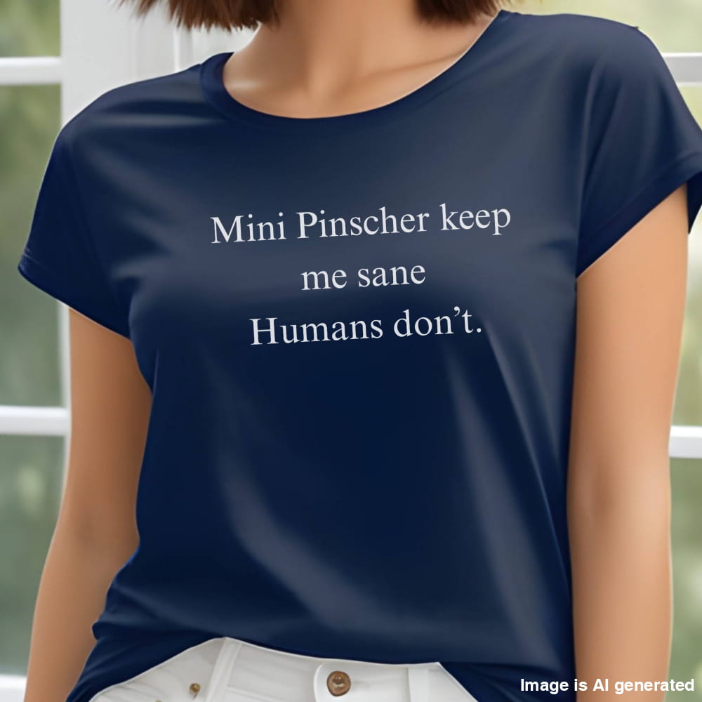 Navy unisex t-shirt with white text: "Mini Pinscher keep me sane. Humans don’t." displayed on plain background