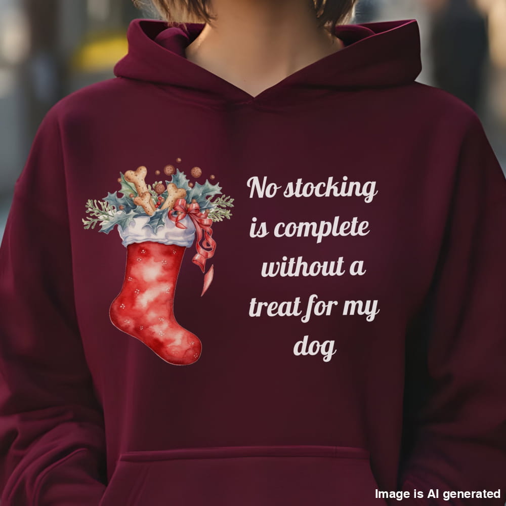 Maroon hoodie with Christmas stocking design and text on a blurred background