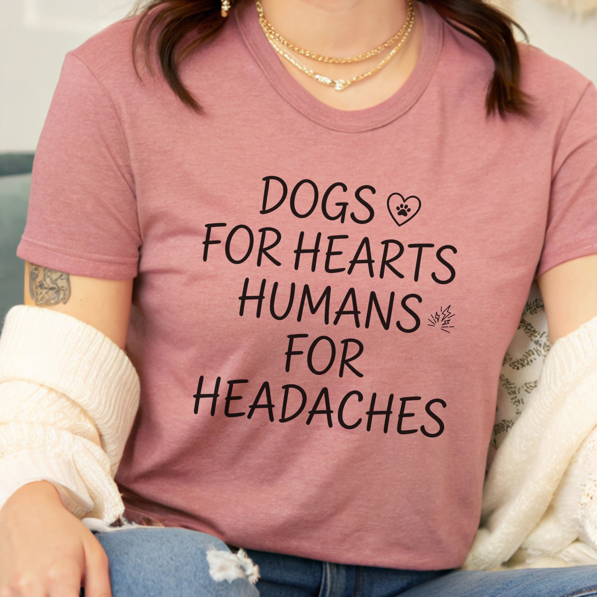 Person wearing a pink t-shirt with a humorous text design.