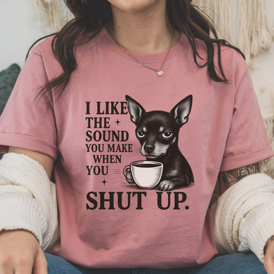 Woman wearing a heather mauve "I Like The Sound You Make When You Shut Up" Mini Pinscher unisex t-shirt holding coffee
