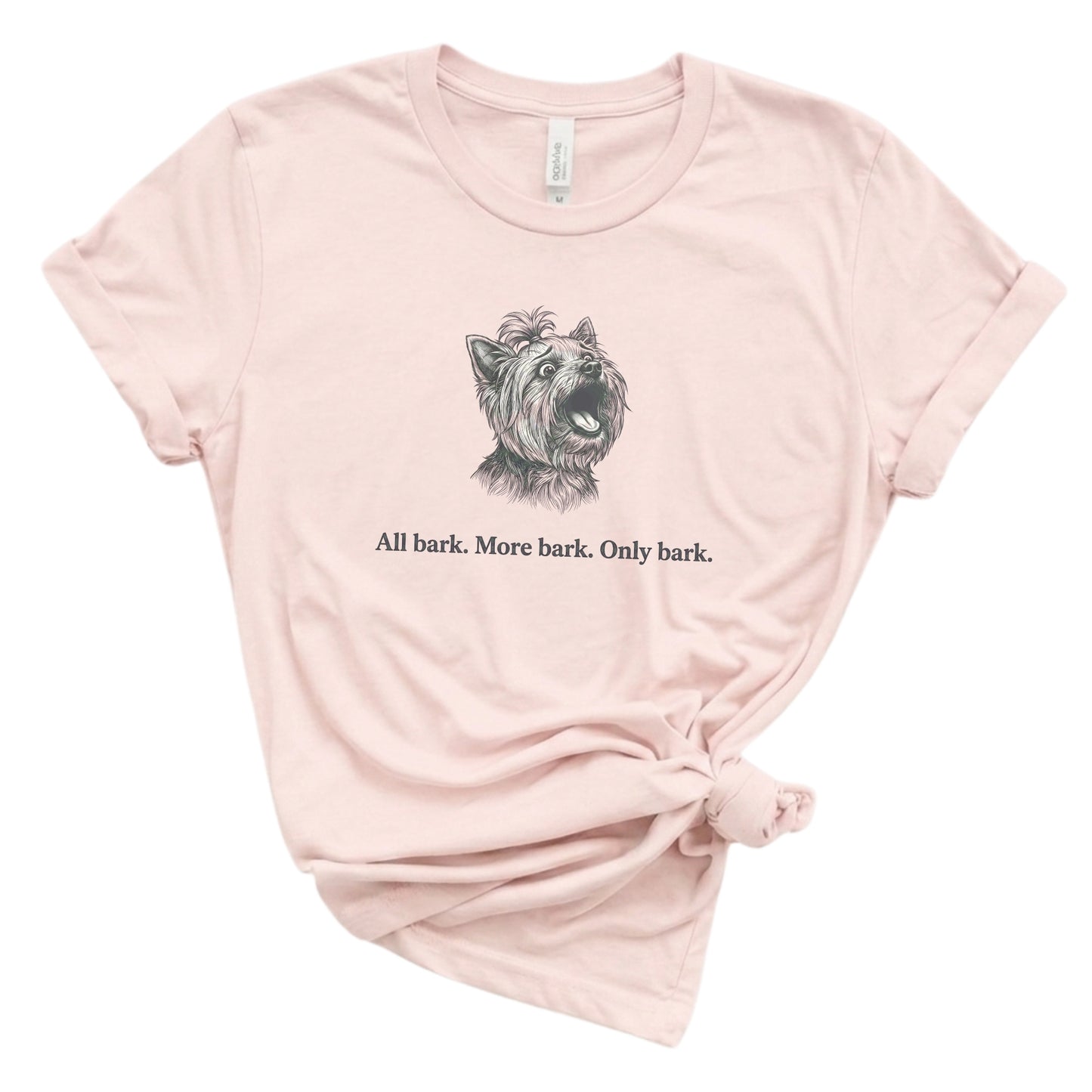 Pink t-shirt with a dog graphic and text on a white background