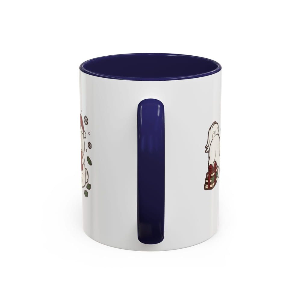White ceramic mug with a navy interior and navy handle, back view with partial Maltese illustrations on either side of the handle.