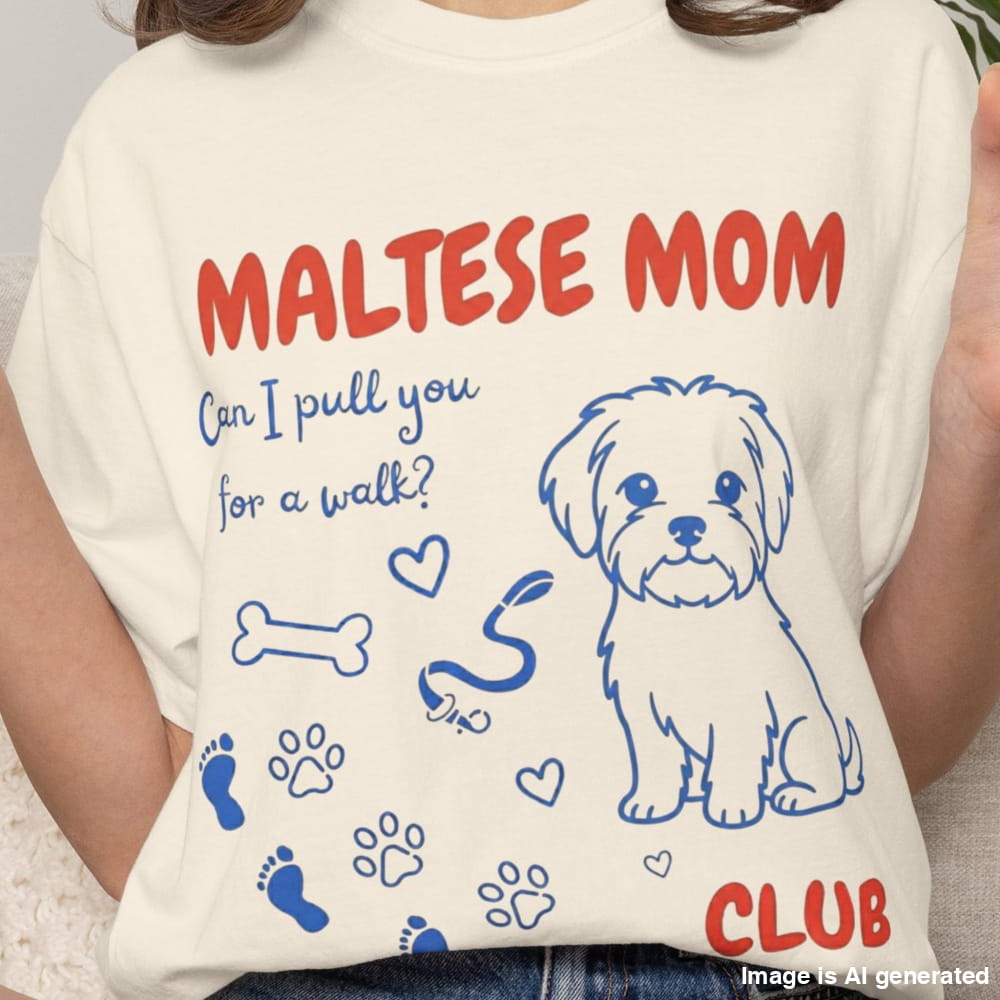 Person wearing a t-shirt with 'Maltese Mom' and dog illustrations.