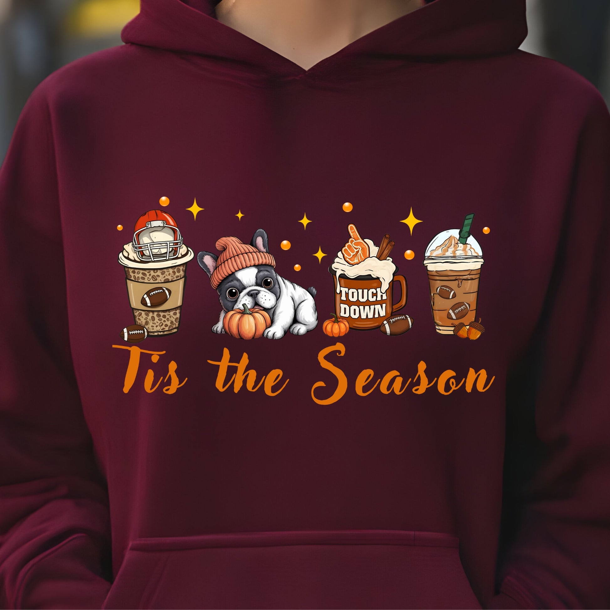 Maroon hoodie with cute French Bulldog, pumpkin, football mug, autumn drinks and “Tis the Season” text