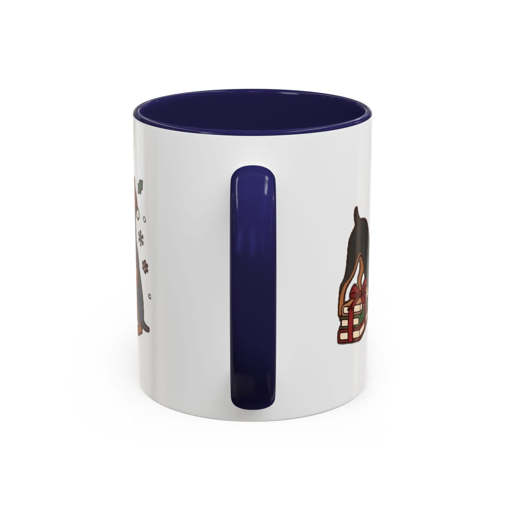 White ceramic mug with a navy interior and navy handle, back view with partial Mini Pinscher illustrations on either side of the handle.