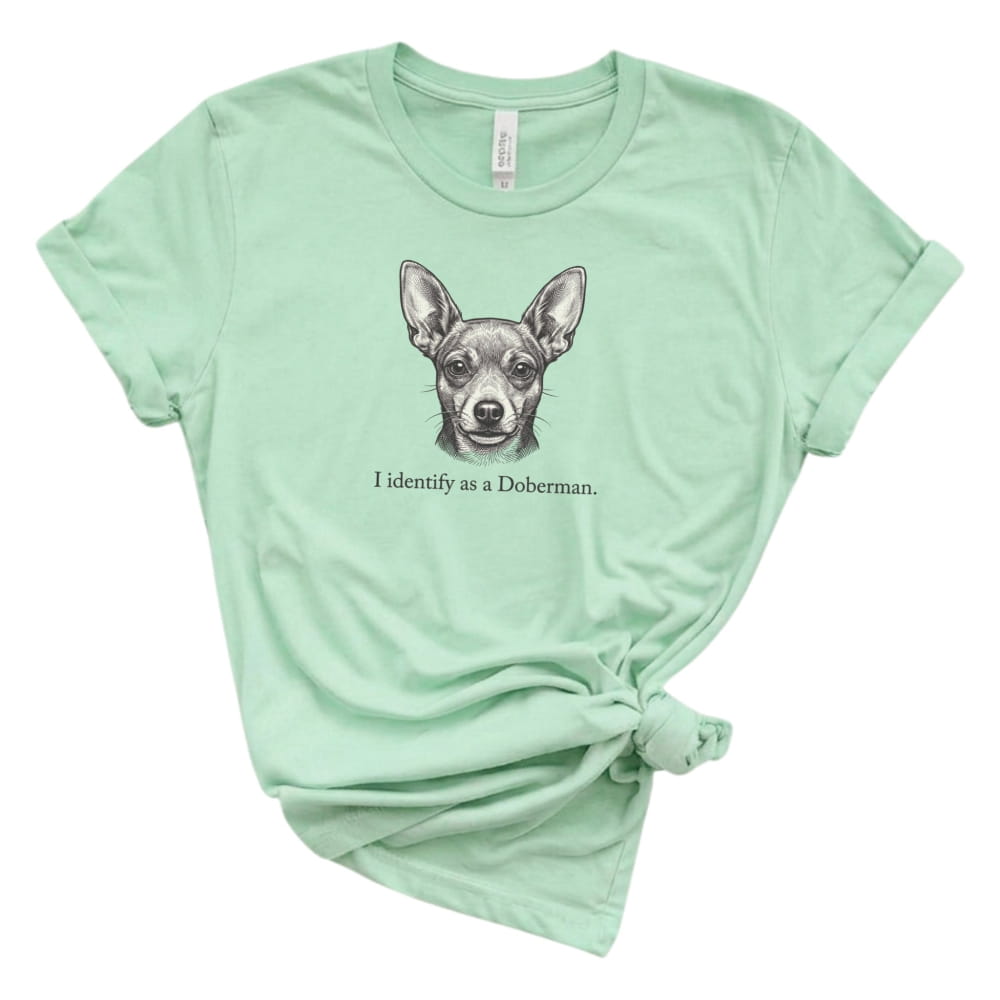 Mint green t-shirt with a Doberman graphic and text on a white background