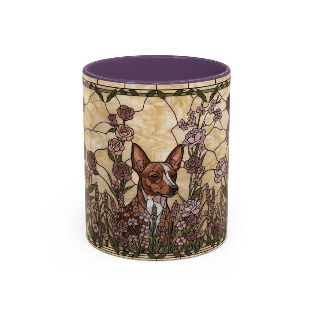 A ceramic mug featuring a stained-glass style illustration of a small brown and white dog surrounded by pink roses and purple flowers, with a solid purple interior.
