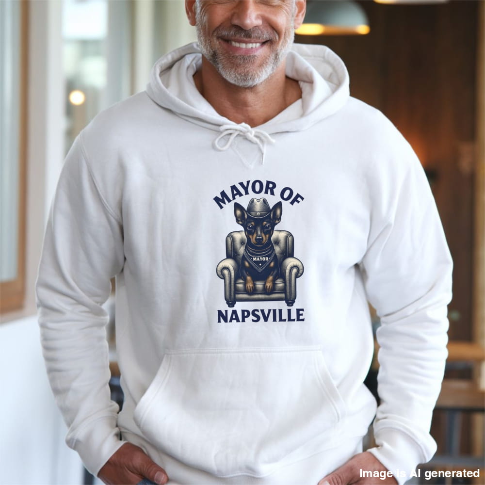 Man wearing a white "Mayor of Napsville" Miniature Pinscher hoodie with a dog on an armchair and funny nap design