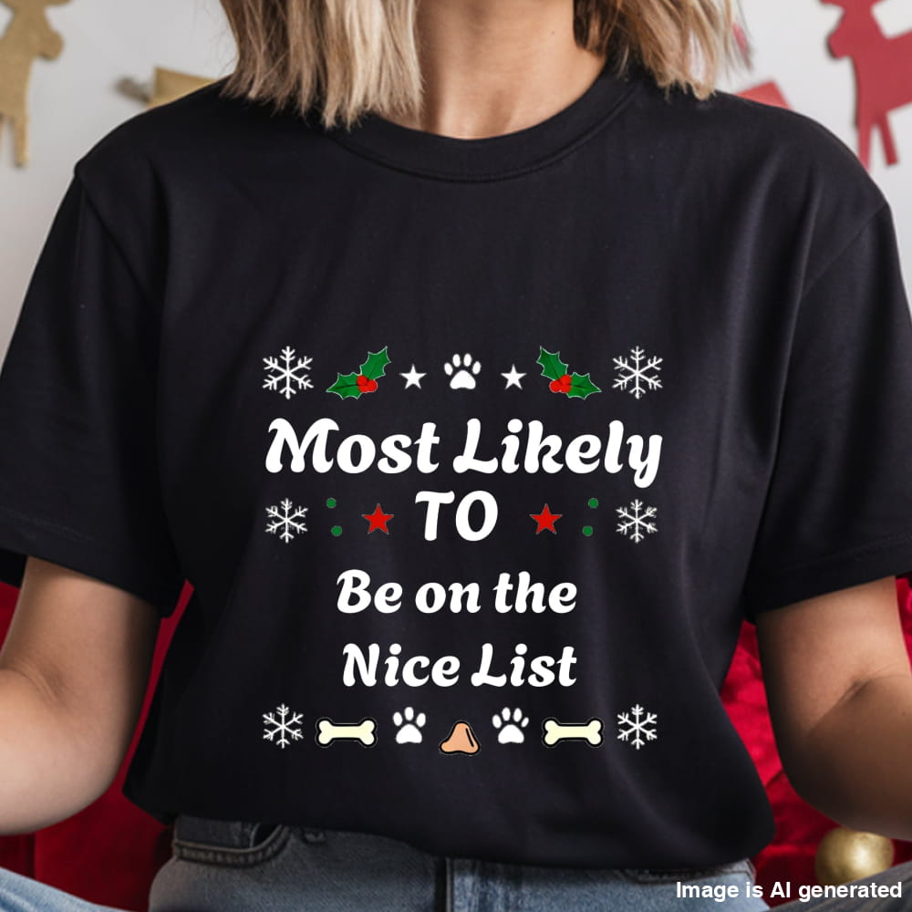 Black t-shirt with Christmas-themed text and graphics worn by a person.