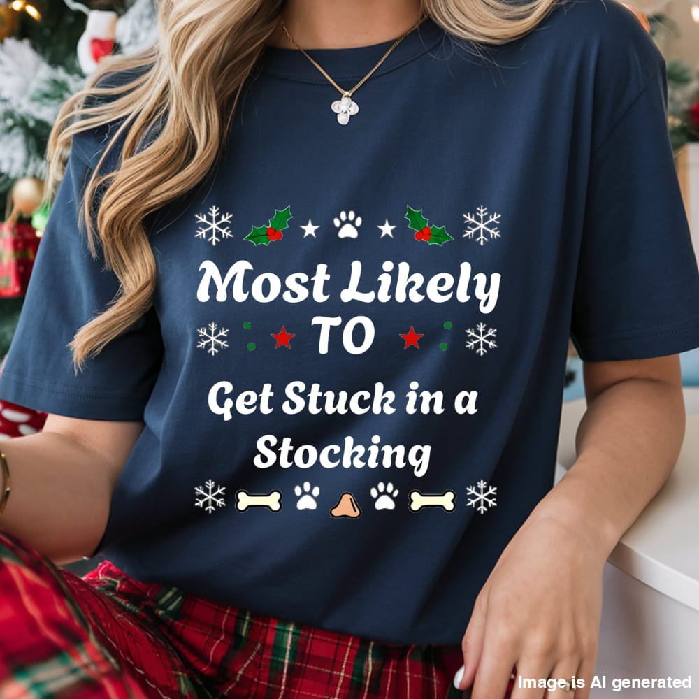 Person wearing a navy blue t-shirt with Christmas-themed text and graphics.