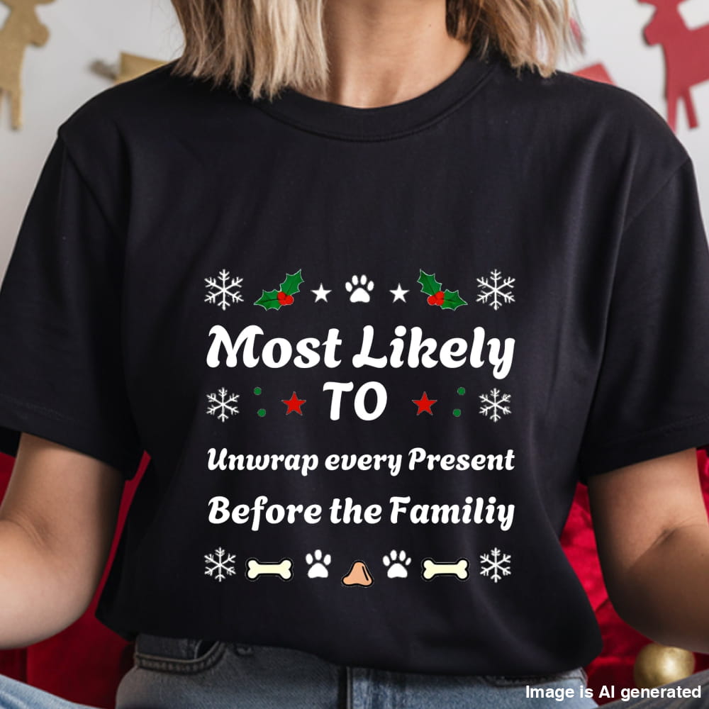 Black t-shirt with Christmas-themed text and graphics worn by a person.