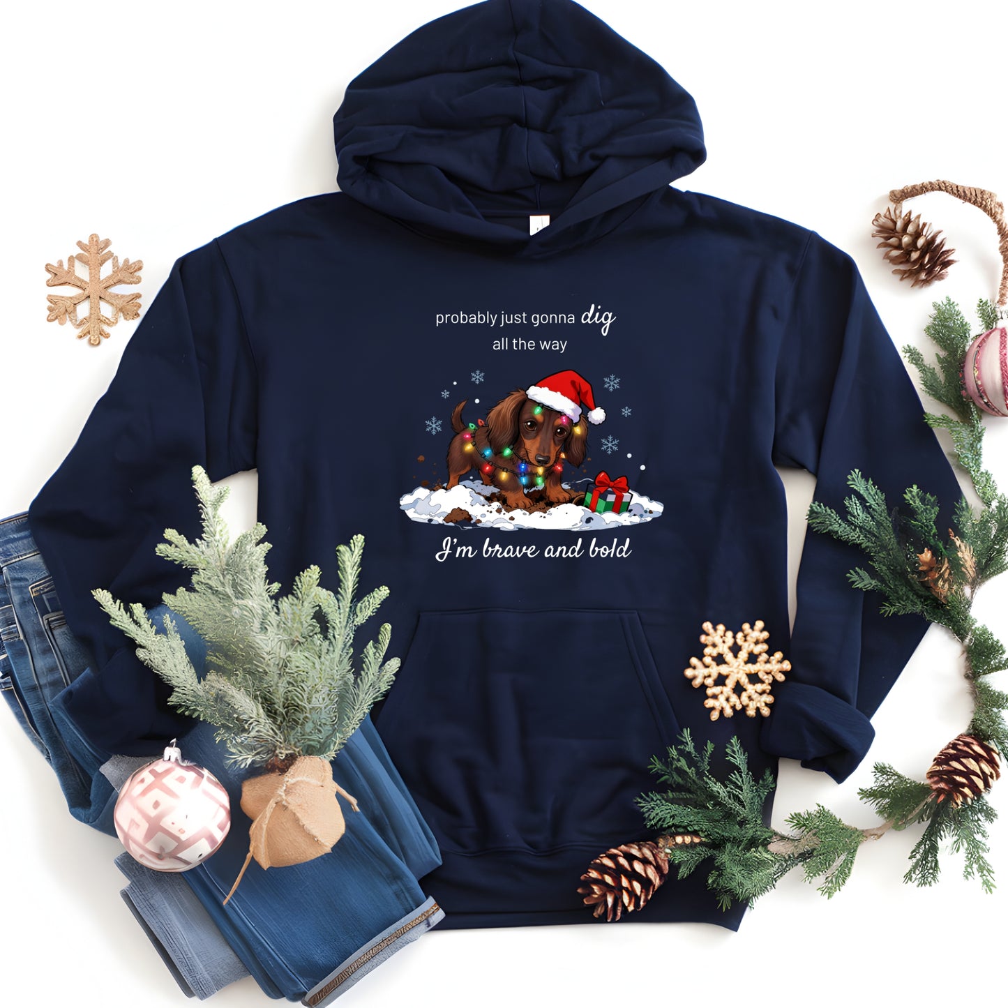 Navy blue hoodie with Christmas-themed design featuring a dog, surrounded by festive decorations on a white background.