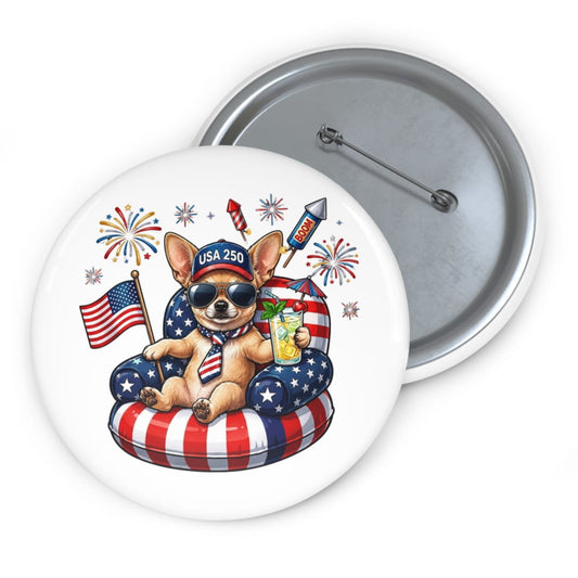 Button badge with a dog wearing sunglasses, an American flag hat, and sitting on a flag cushion with fireworks and a rocket in the background.