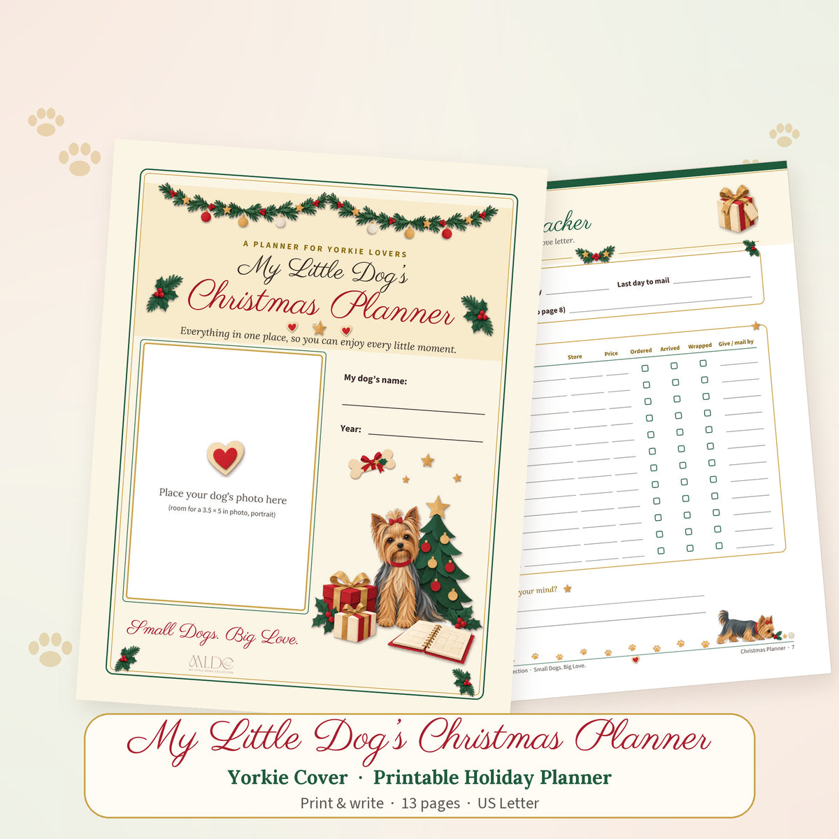 Printable Christmas planner with the Yorkie cover showing a Yorkie with a red bow by a Christmas tree and gifts, next to an inside page with the breed sniffing along the footer