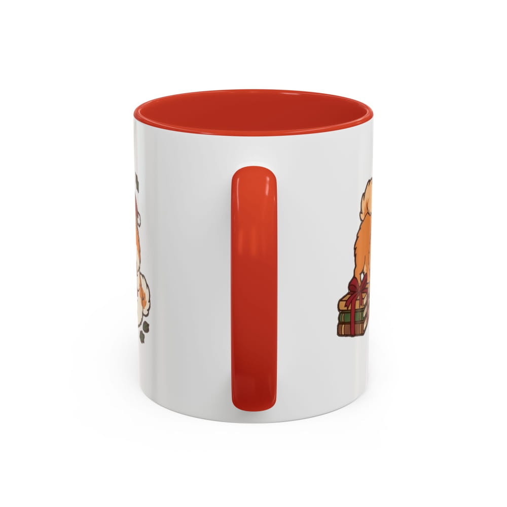 White ceramic mug with a red interior and red handle, back view with partial Pomeranian illustrations on either side of the handle.