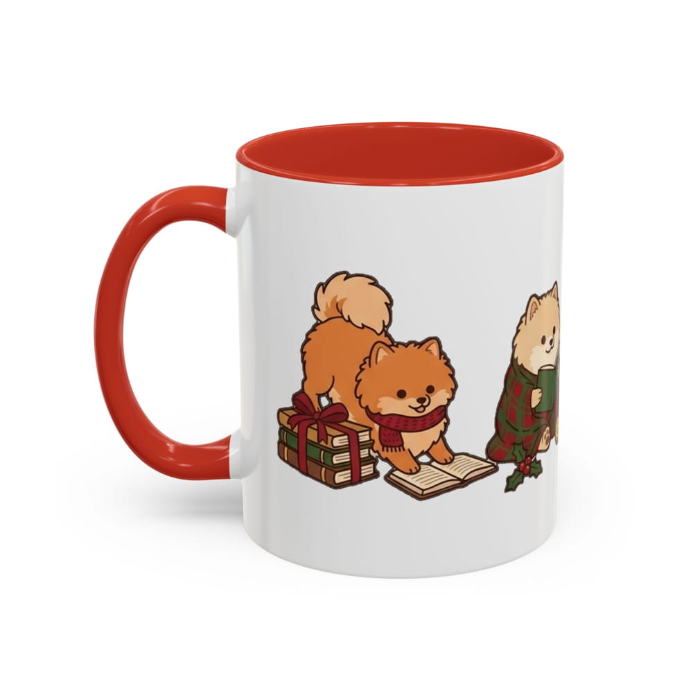 White ceramic mug with a red interior and red handle, showing an orange Pomeranian in a red scarf beside a wrapped gift and a cream Pomeranian in a plaid blanket.