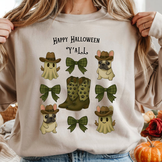 Person wearing a beige sweatshirt with Halloween-themed graphics and text.