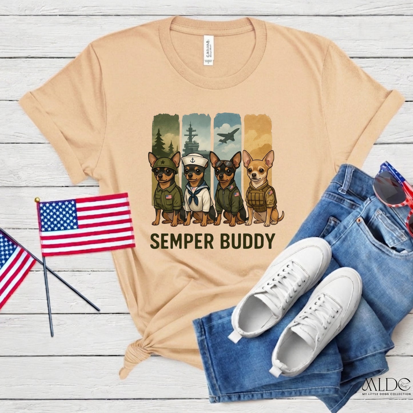Beige t-shirt with dog graphic and 'Semper Buddy' text, paired with jeans and sneakers on a wooden surface.