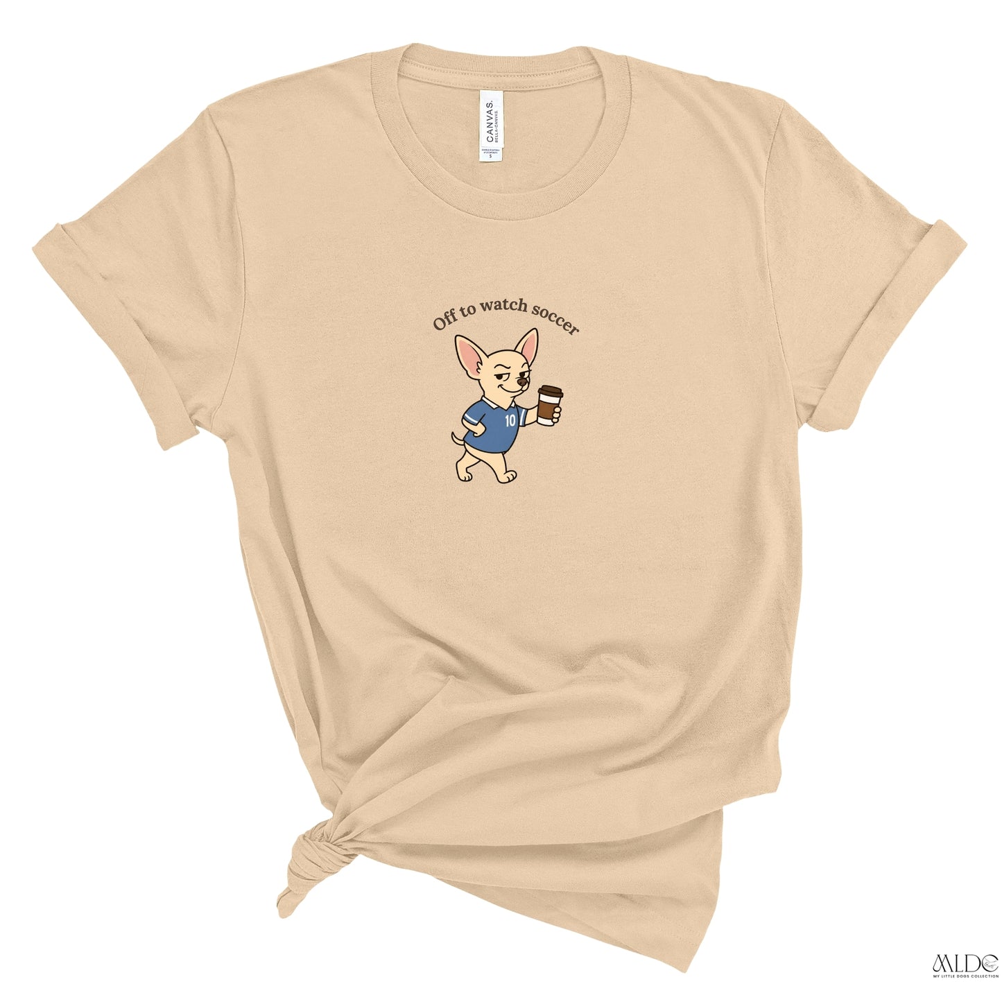Beige t-shirt with a dog graphic and text on a white background