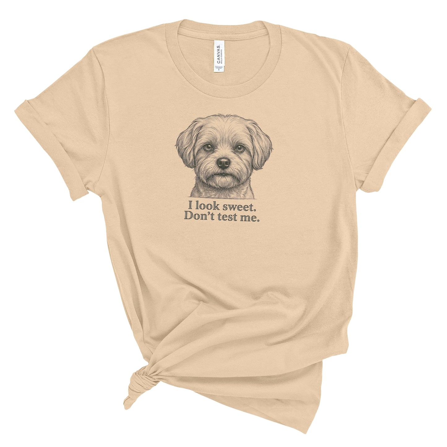 Beige t-shirt with a dog graphic and text on a white background