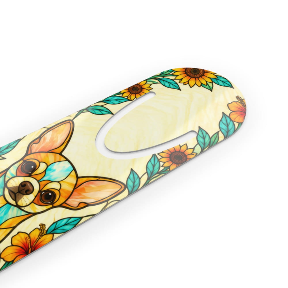 A close-up of a curved product, likely a handle or grip, featuring a stained-glass style illustration of a Chihuahua dog surrounded by sunflowers and teal leaves on a pale yellow background.
