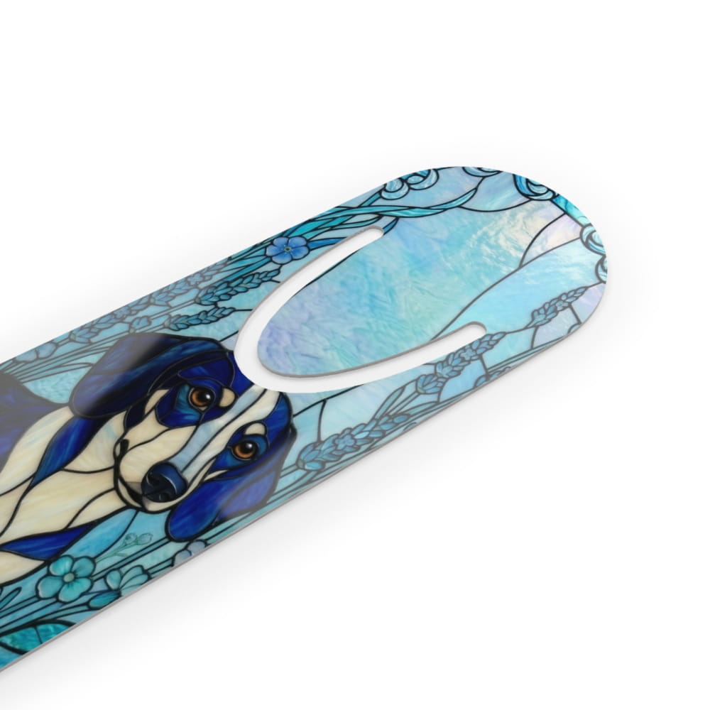 A close-up of a decorative product with a stained-glass-style illustration of a blue and cream dog, featuring a white oval cutout in the center, shown on a plain white background.