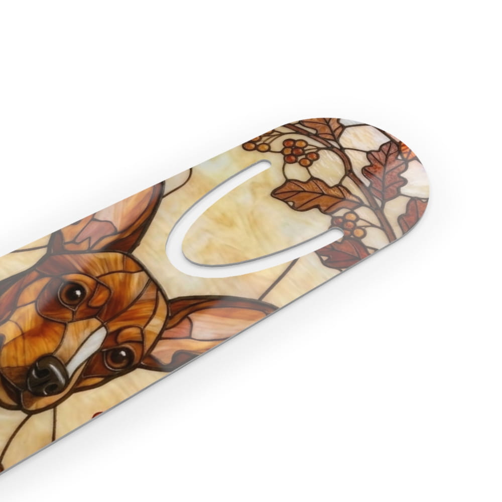 A close-up of a decorative product with a stained-glass-style dog face and autumn leaves design, featuring a white U-shaped cutout in the center, shown on a plain white background.