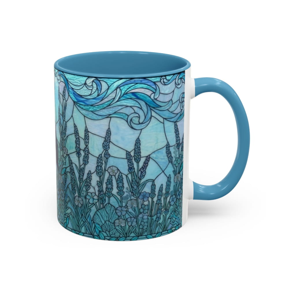 A ceramic mug with a blue handle and interior, featuring a stained-glass style illustration of blue sea waves and sea plants on the exterior, shown against a plain white background.
