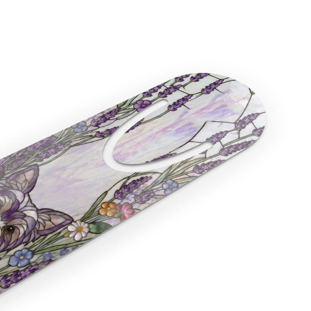 A close-up of a decorative product, likely a tool or accessory with a curved shape, featuring a detailed floral and butterfly illustration in purple, green, pink, and white on a clean white background.