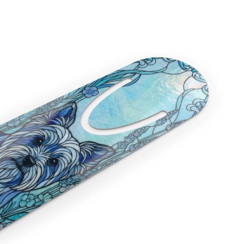 A close-up of a decorative product, likely a strap or accessory, featuring a stylized blue and white dog illustration with floral Art Nouveau-style line art on a white background.