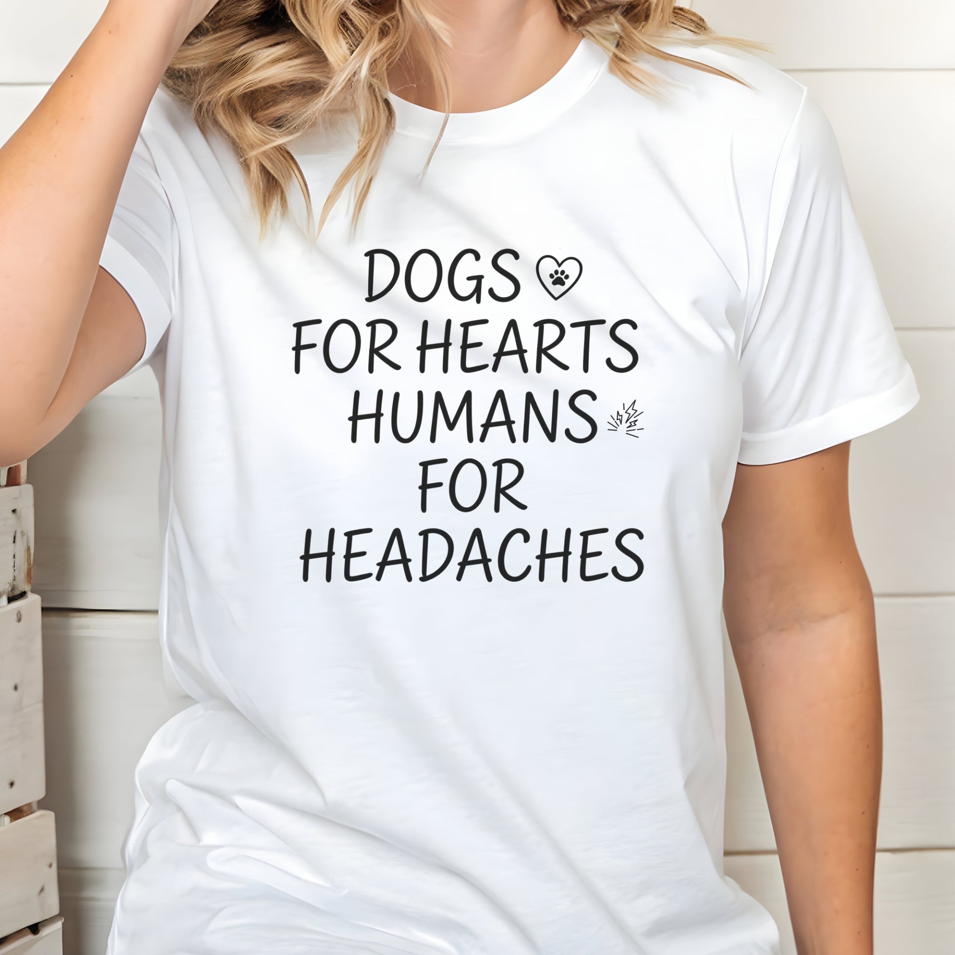 Person wearing a white t-shirt with a humorous text design.