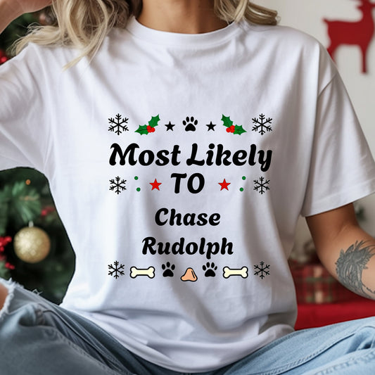 Person wearing a white t-shirt with Christmas-themed text and graphics.