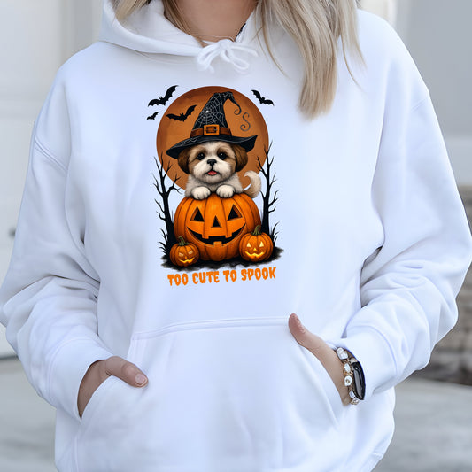 White hoodie with Halloween-themed design featuring a dog in a pumpkin and text 'Too Cute to Spook'.