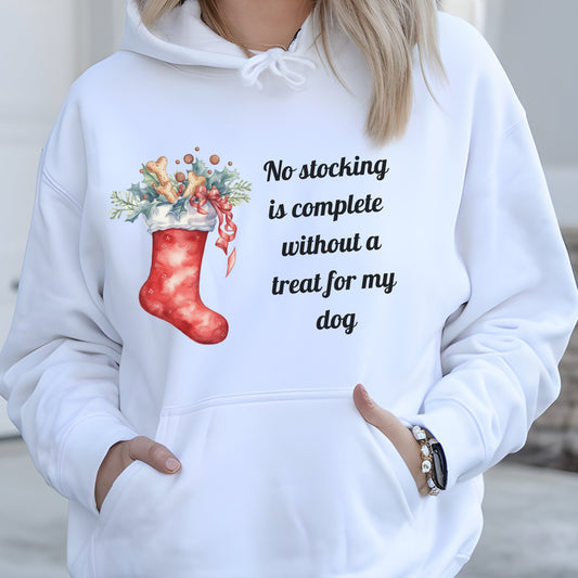 White Christmas dog lover hoodie with a festive stocking filled with treats and a holiday quote reading “No stocking is complete without a treat for my dog.