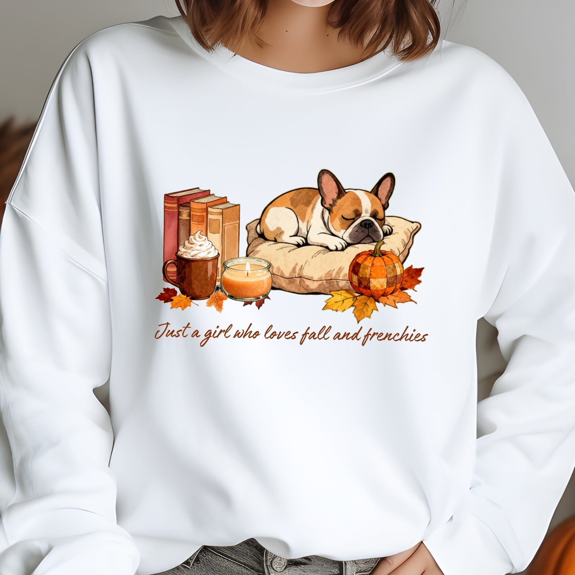 White sweatshirt with a dog, books, pumpkin, and fall-themed design on a gray background