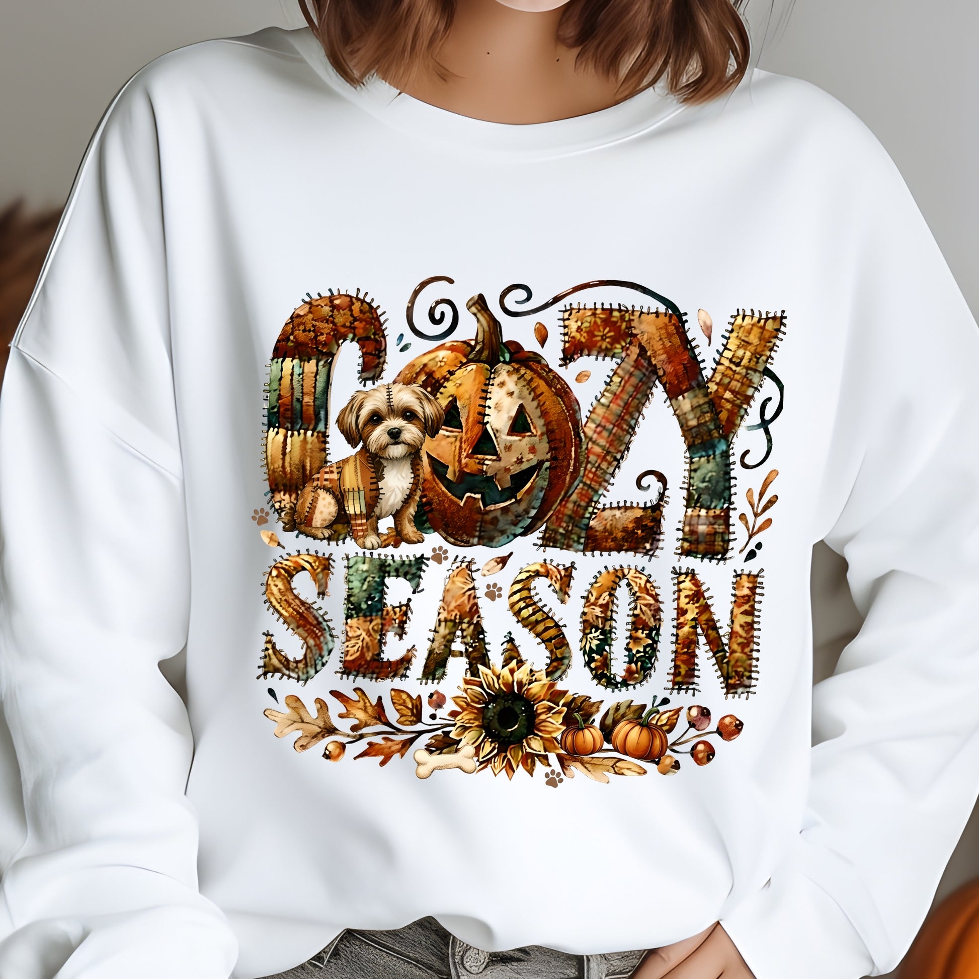 White sweatshirt with 'Glozy Season' design featuring a pumpkin, dog, and decorative elements.