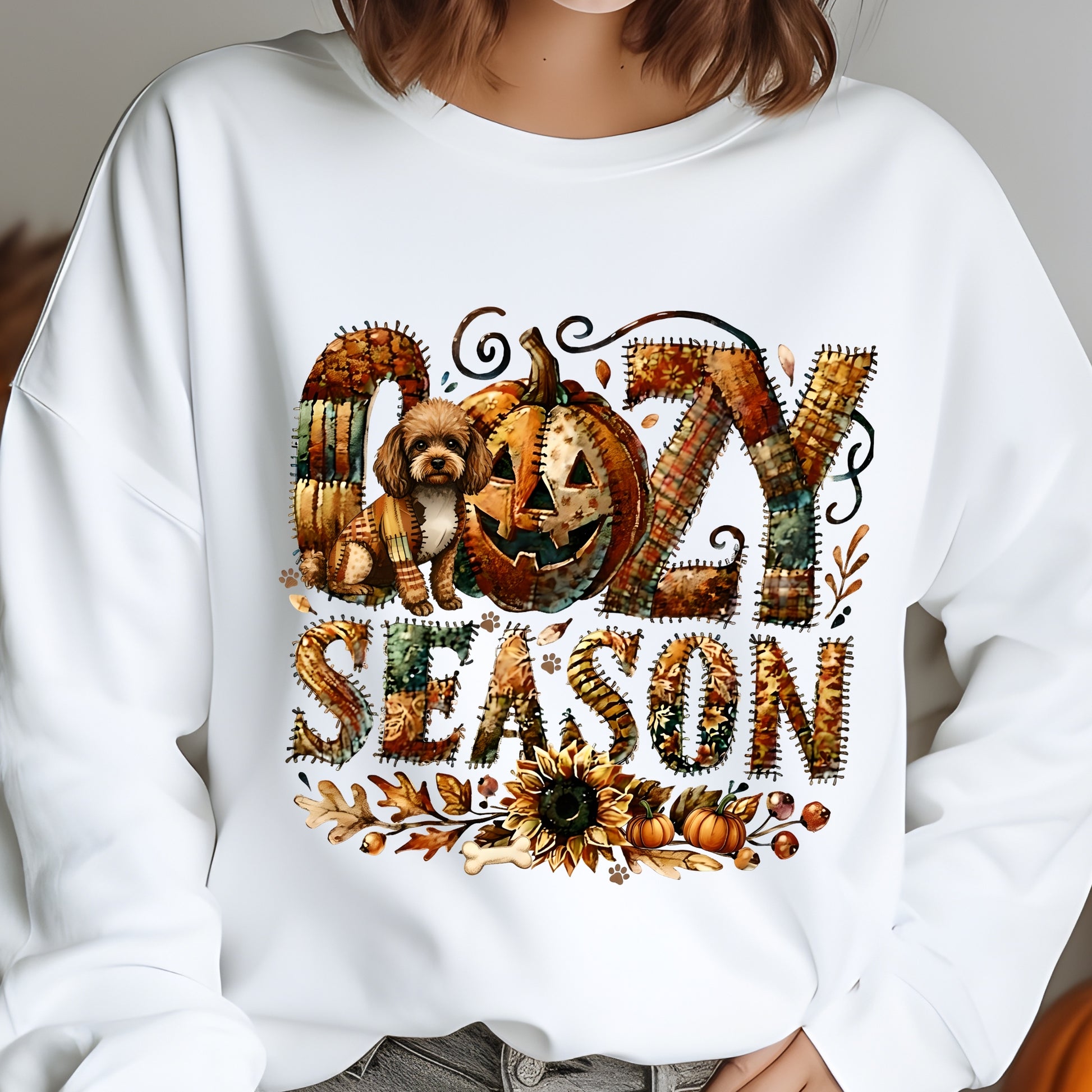 White sweatshirt with 'Crazy Season' design featuring pumpkins and a dog.