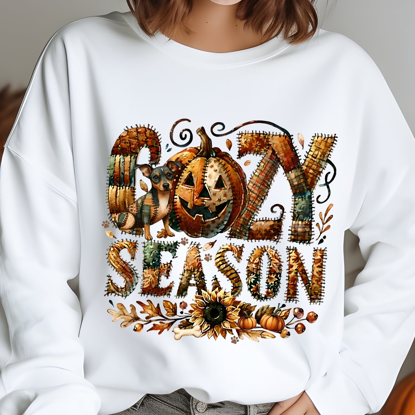 White sweatshirt with 'Ozzy Season' design featuring a dog and pumpkin.