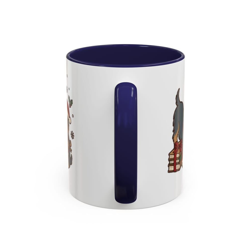 White ceramic mug with a navy interior and navy handle, back view with partial Yorkie illustrations on either side of the handle.