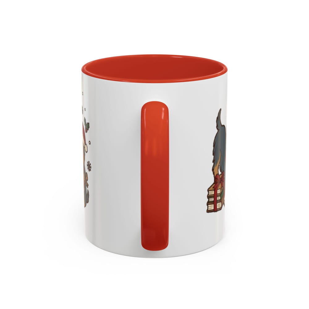 White ceramic mug with a red interior and red handle, back view with partial Yorkie illustrations on either side of the handle.