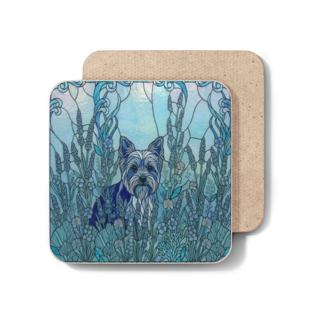 Two square coasters with rounded corners, one featuring a blue stained-glass-style illustration of a small dog in a flower field, and the other showing the natural tan textured back side, set against a plain white background.