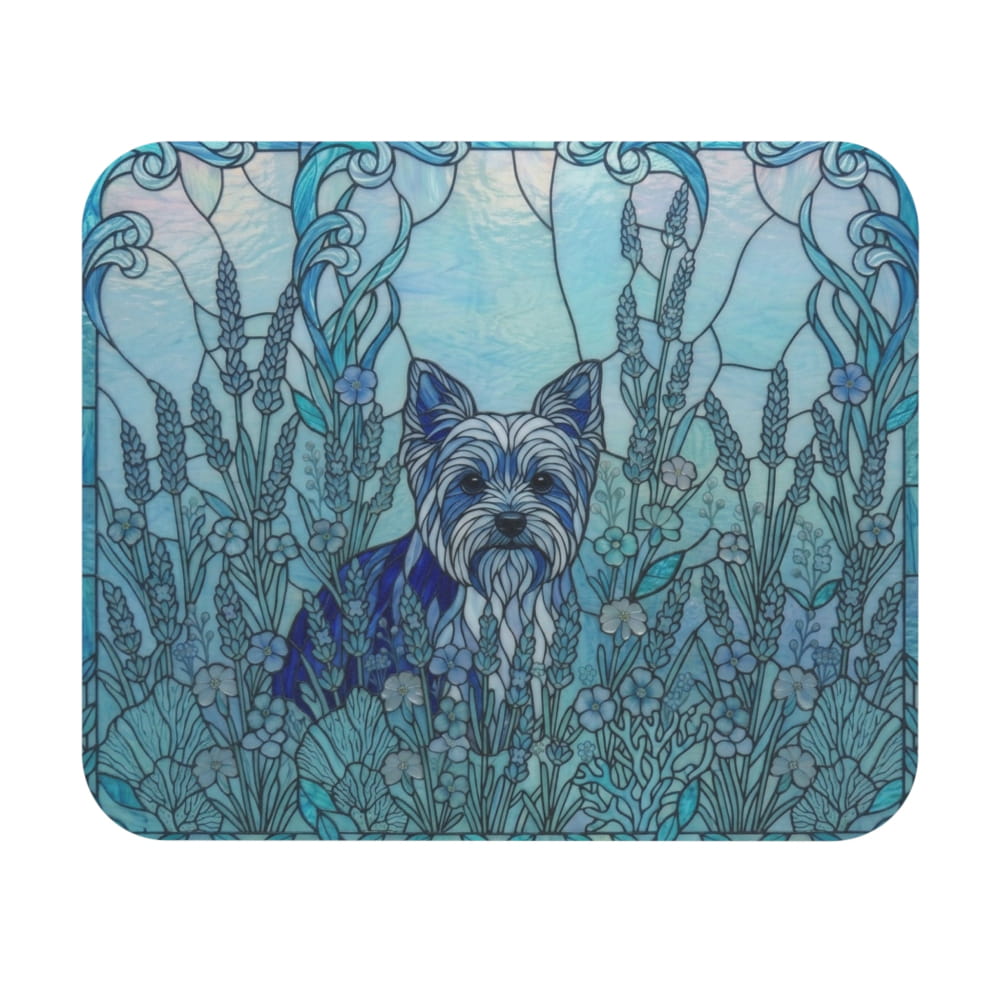 A square decorative item with rounded corners featuring a stained-glass-style illustration of a small dog surrounded by blue-toned flowers and ornate vines on a white background.