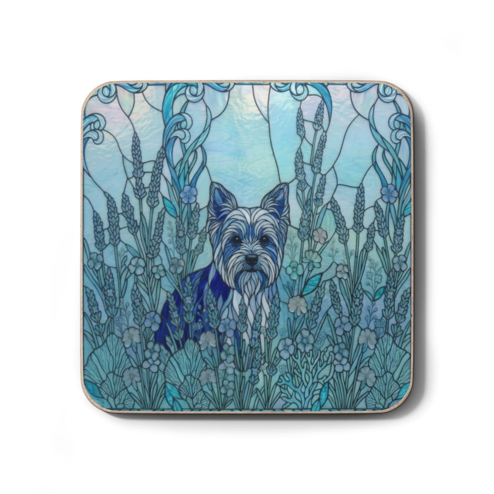 A square coaster with rounded corners featuring a stained-glass style illustration of a wirehaired dog surrounded by blue and green plants, shown on a white background.