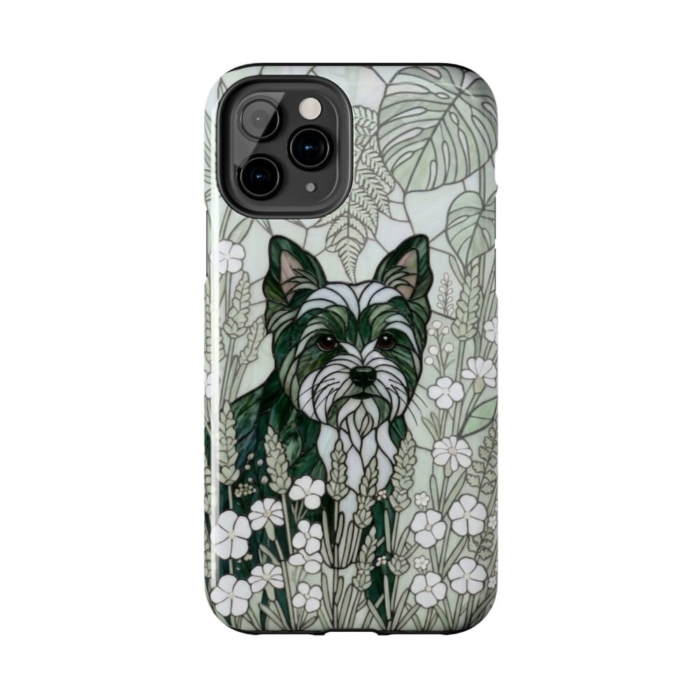 Phone case with a dog illustration on a floral and leaf patterned background